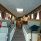 Image for article titled This Beautiful Coach Bus RV Has A Basement Bedroom And A Full Kitchen
